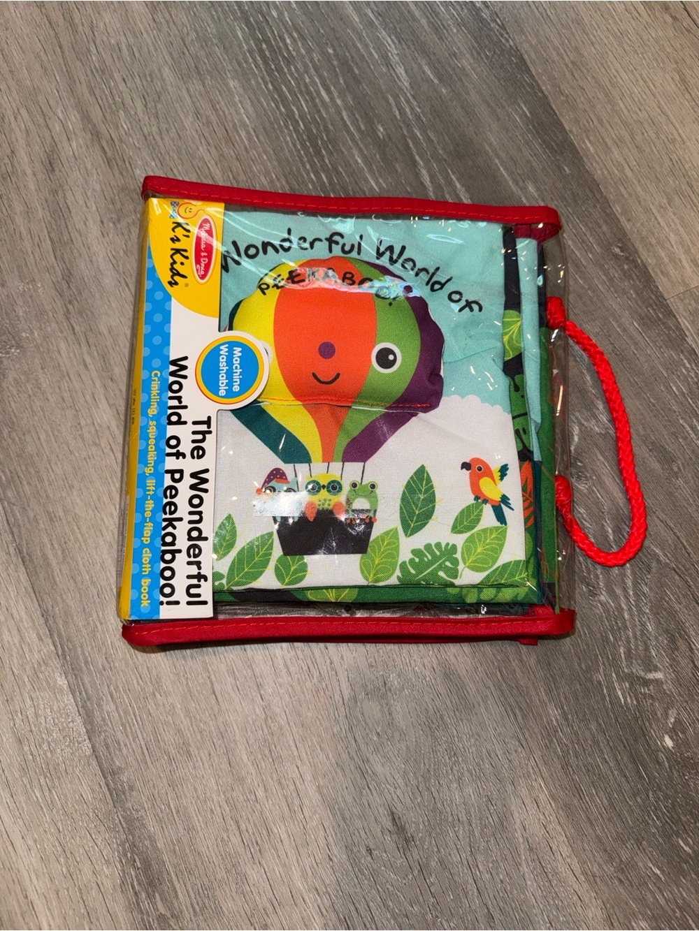🆕 Melissa & Doug Peekaboo book